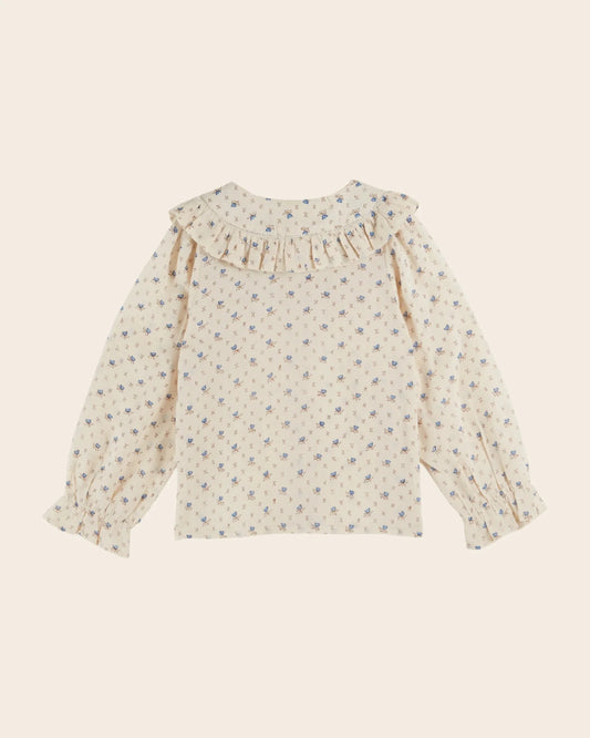ecru blouse with blue flowers